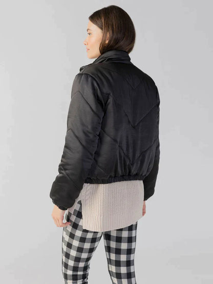 Quilted jacket in black.